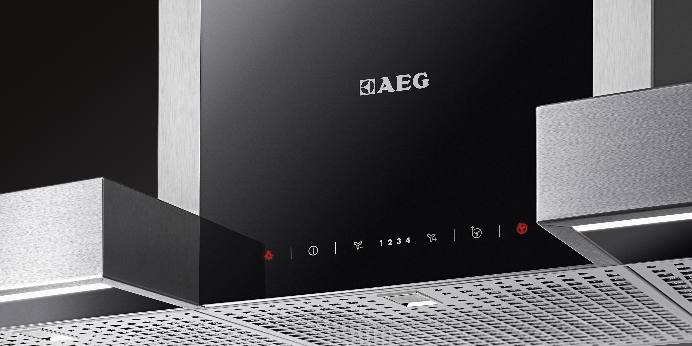 The underneath of an AEG cooker hood showing the hood filter.