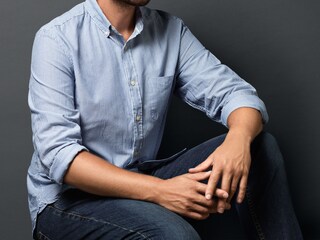 A man wearing a crisp and laundered shirt