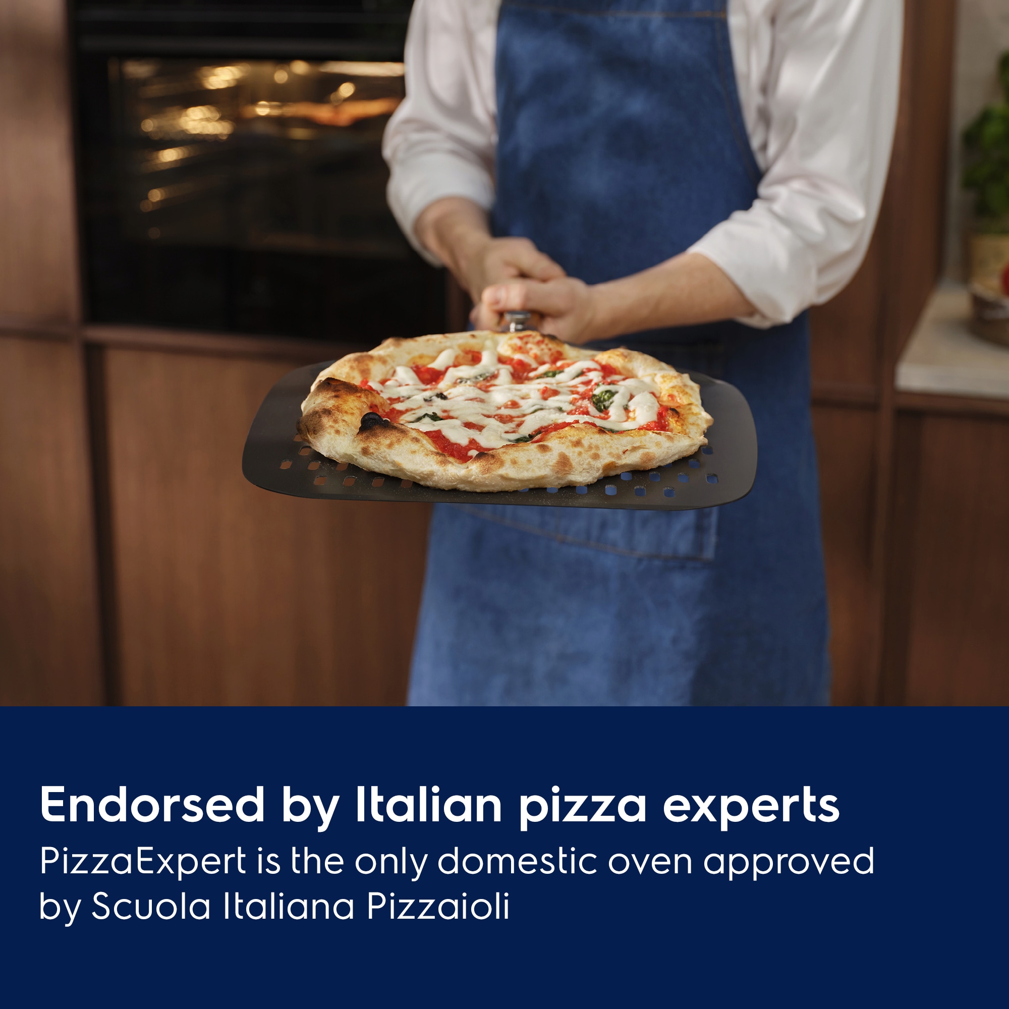 Person holding the pizza expert pizza peel with a Neapolitan pizza