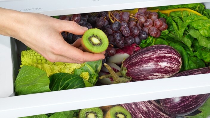Green vegetables in sealed drawer