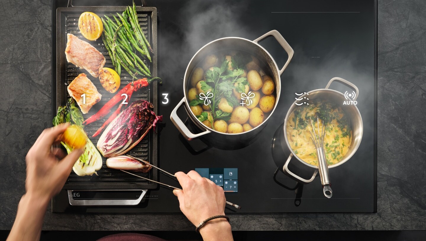 Food getting prepared on a hob.