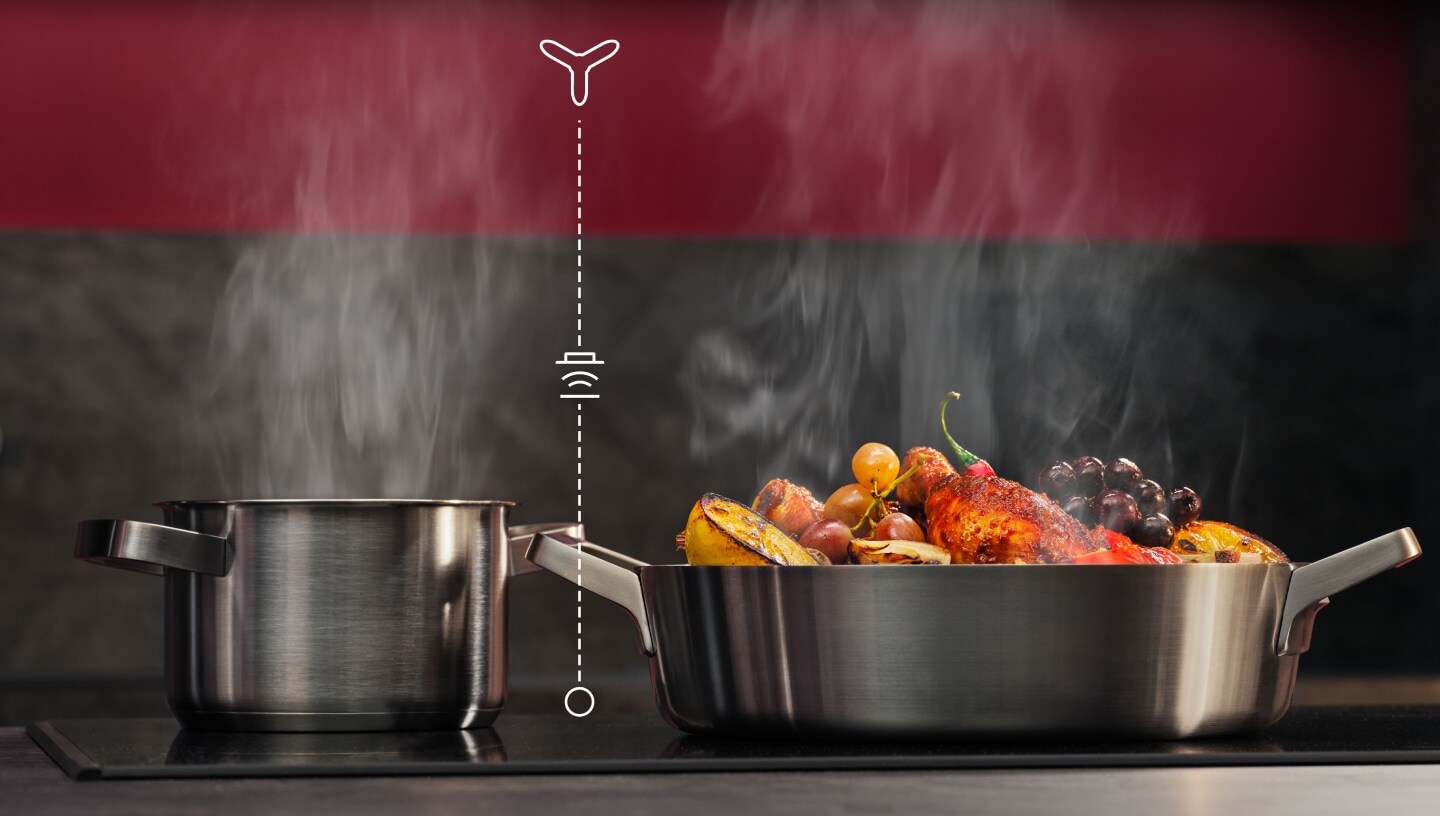 Food in pots cooking on a stove.