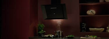 Wall mounted hood in modern kitchen