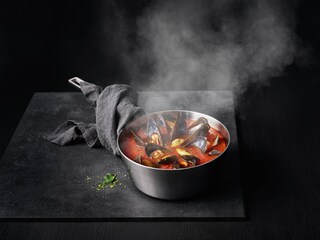 A pan of seafood cooking