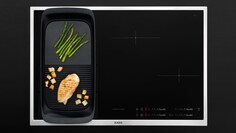 A MaxiSense Combi induction hob with a plancha grill