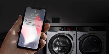 person looking at My AEG Care app in mobile