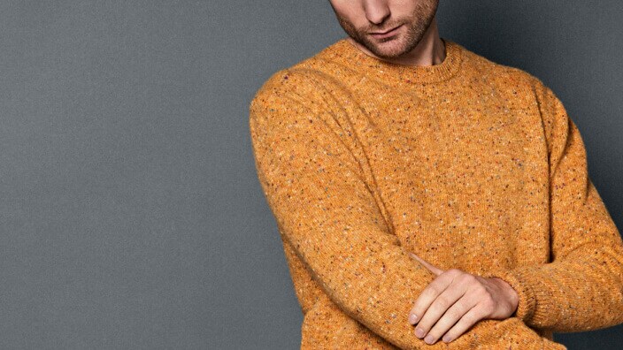 Man in orange sweater