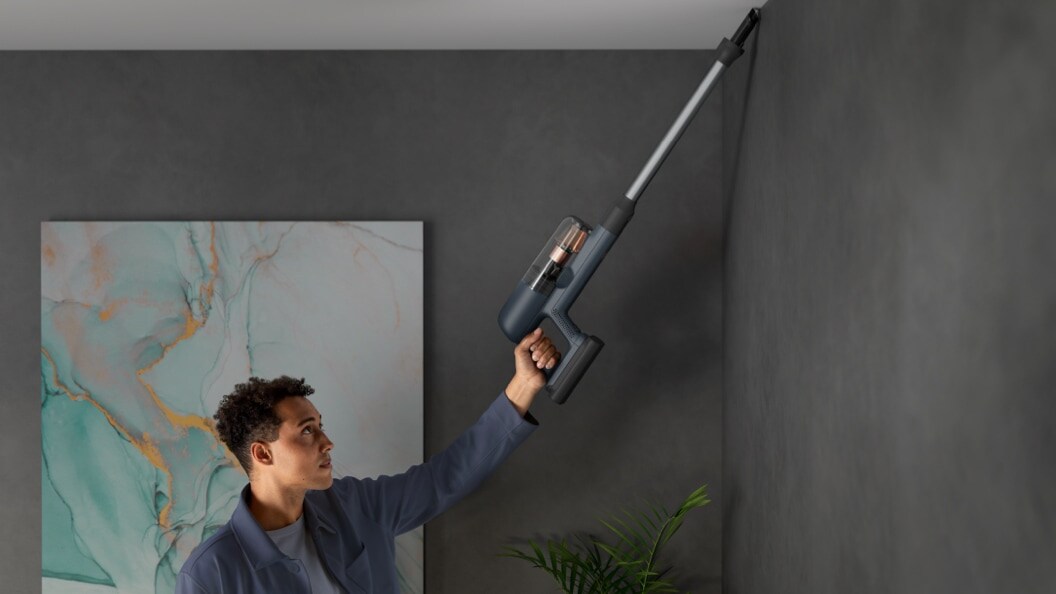 Vacuuming on wall and ceiling