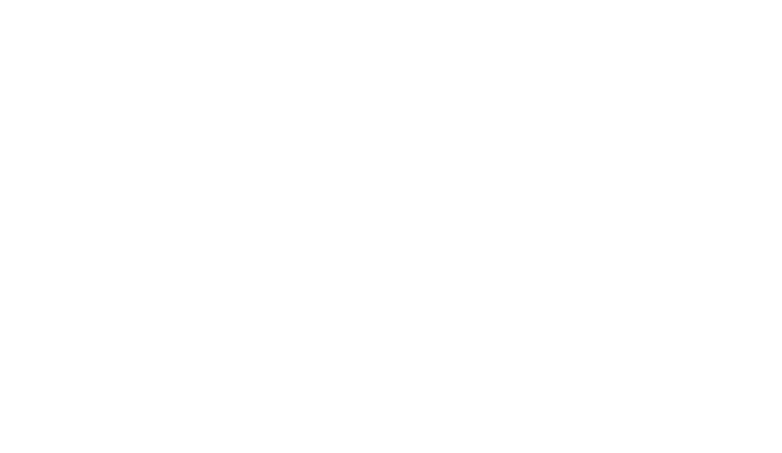 Icon of wrench in sun-shaped badge