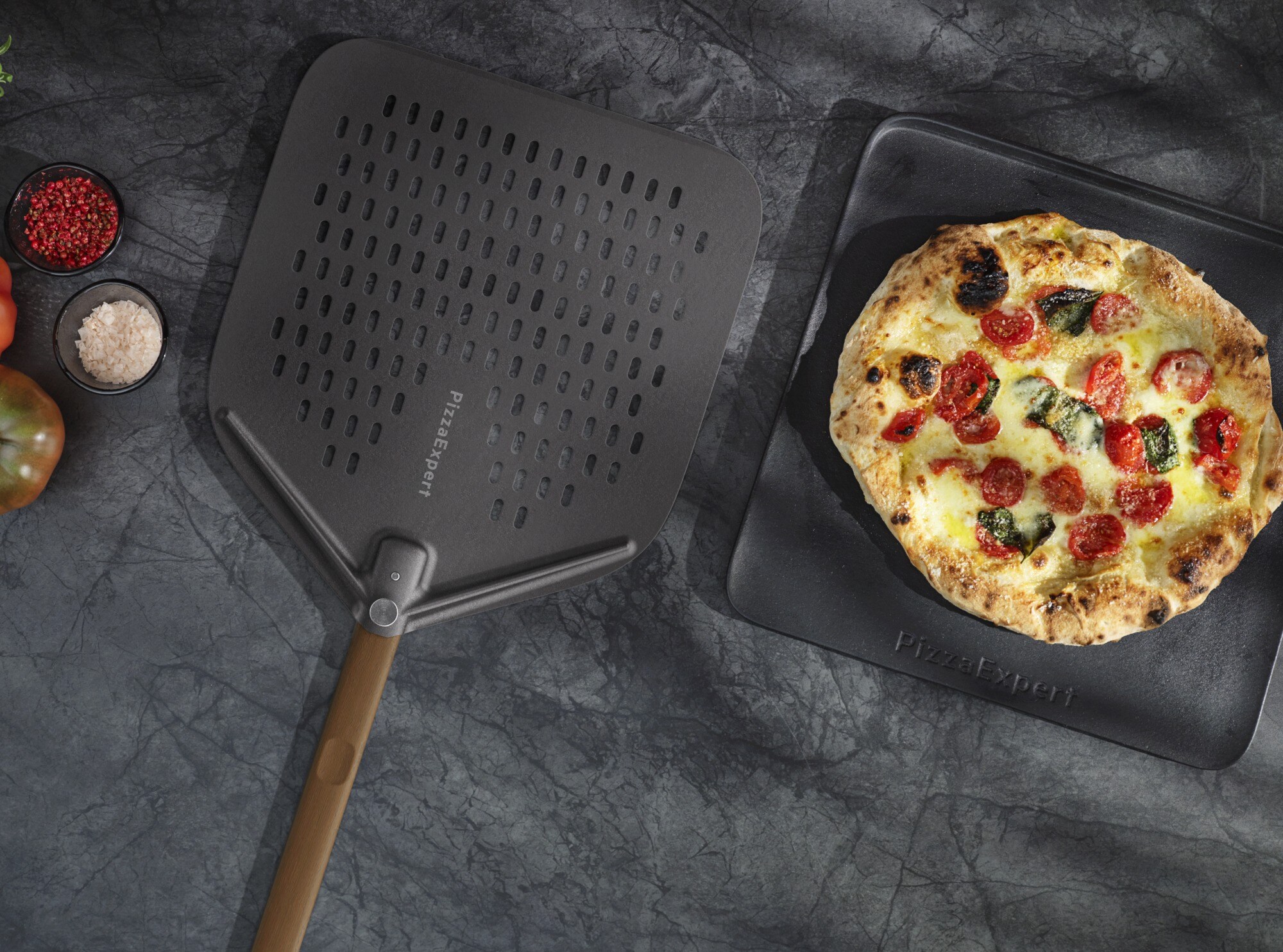 Top view of pizza peel along side of a pizza