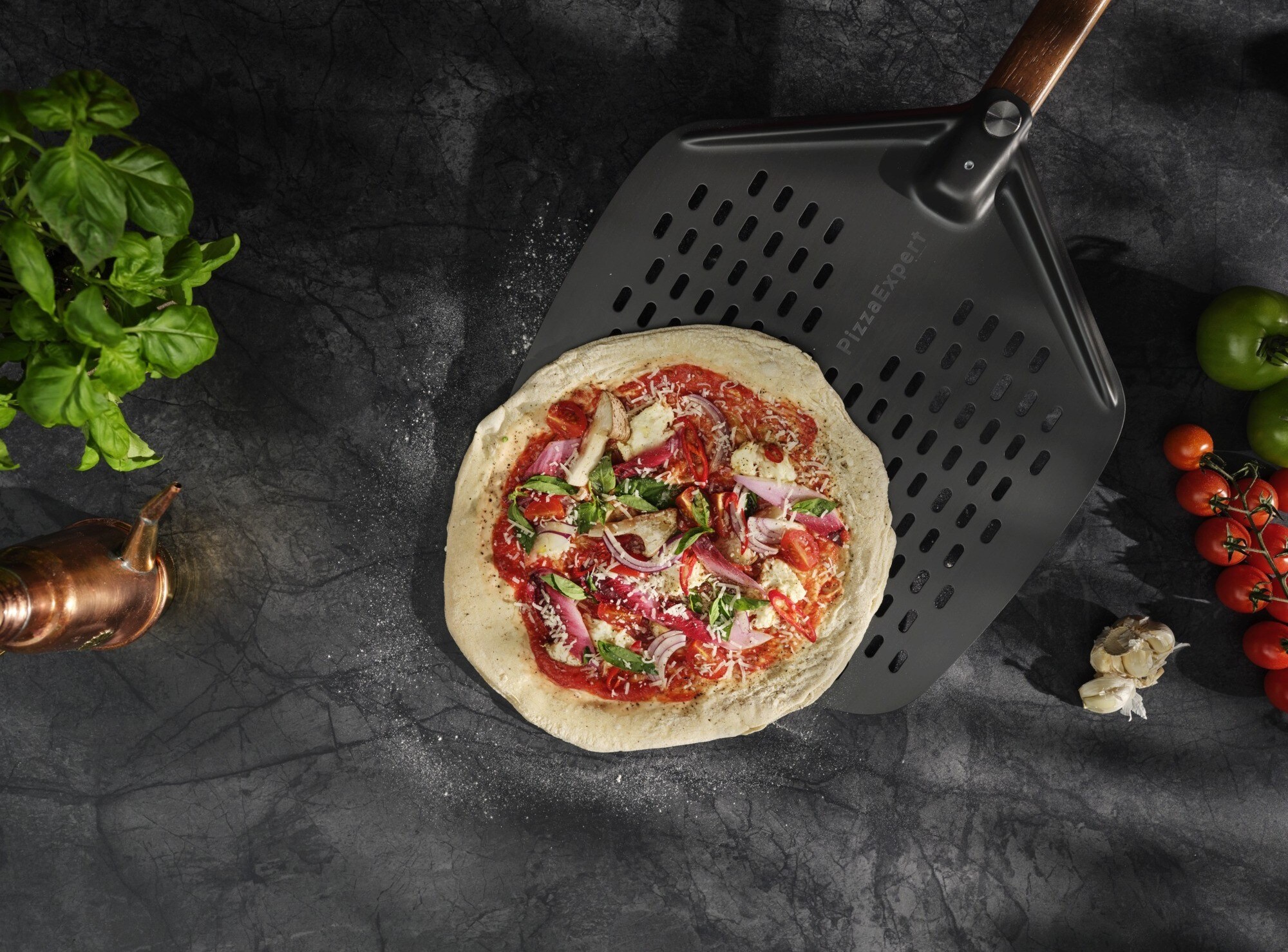picking up pizza with a pizza peel