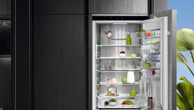 AEG fridge filled with food.