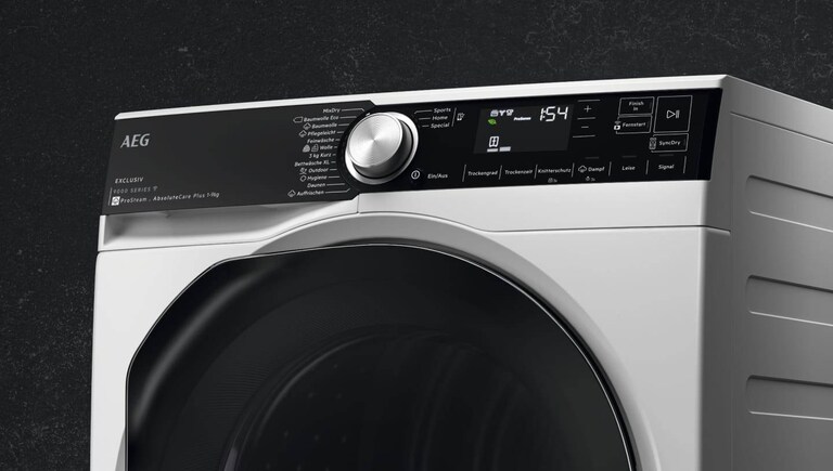 AEG washer dryer with a black background